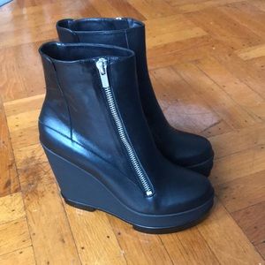 Robert Clergerie wedge platform black boots.